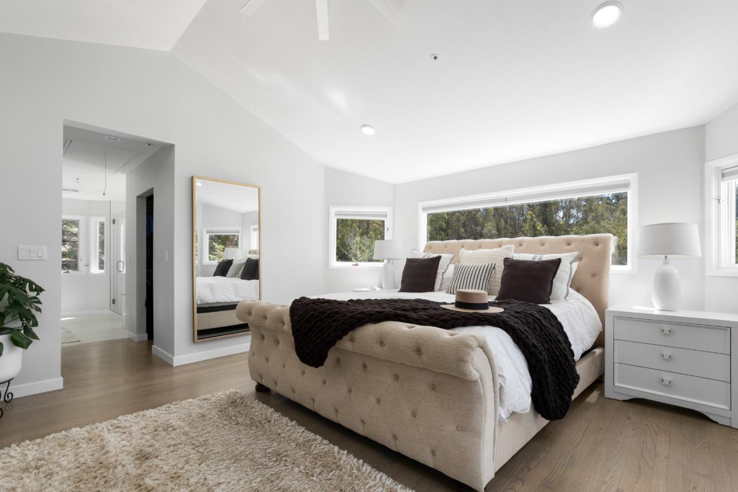 772 Aptos Ridge Circle Watsonville, CA 95076 - Photo 41 of 62 a spacious bedroom with a bed and a couch