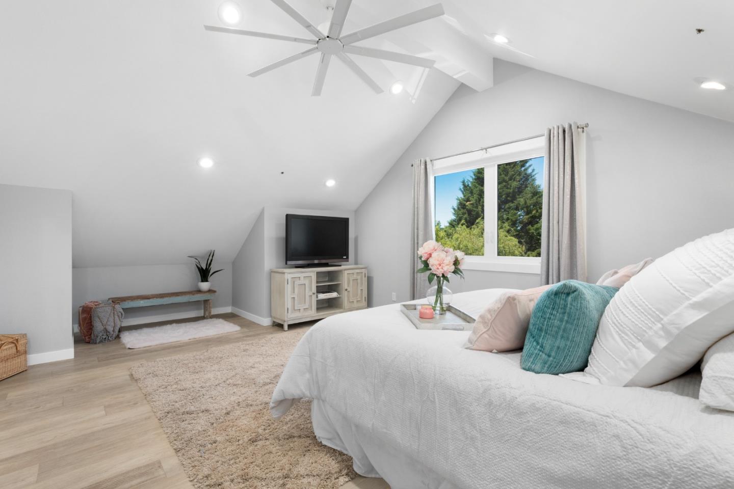 772 Aptos Ridge Circle Watsonville, CA 95076 - Photo 50 of 62 a bedroom with a bed and a flat screen tv