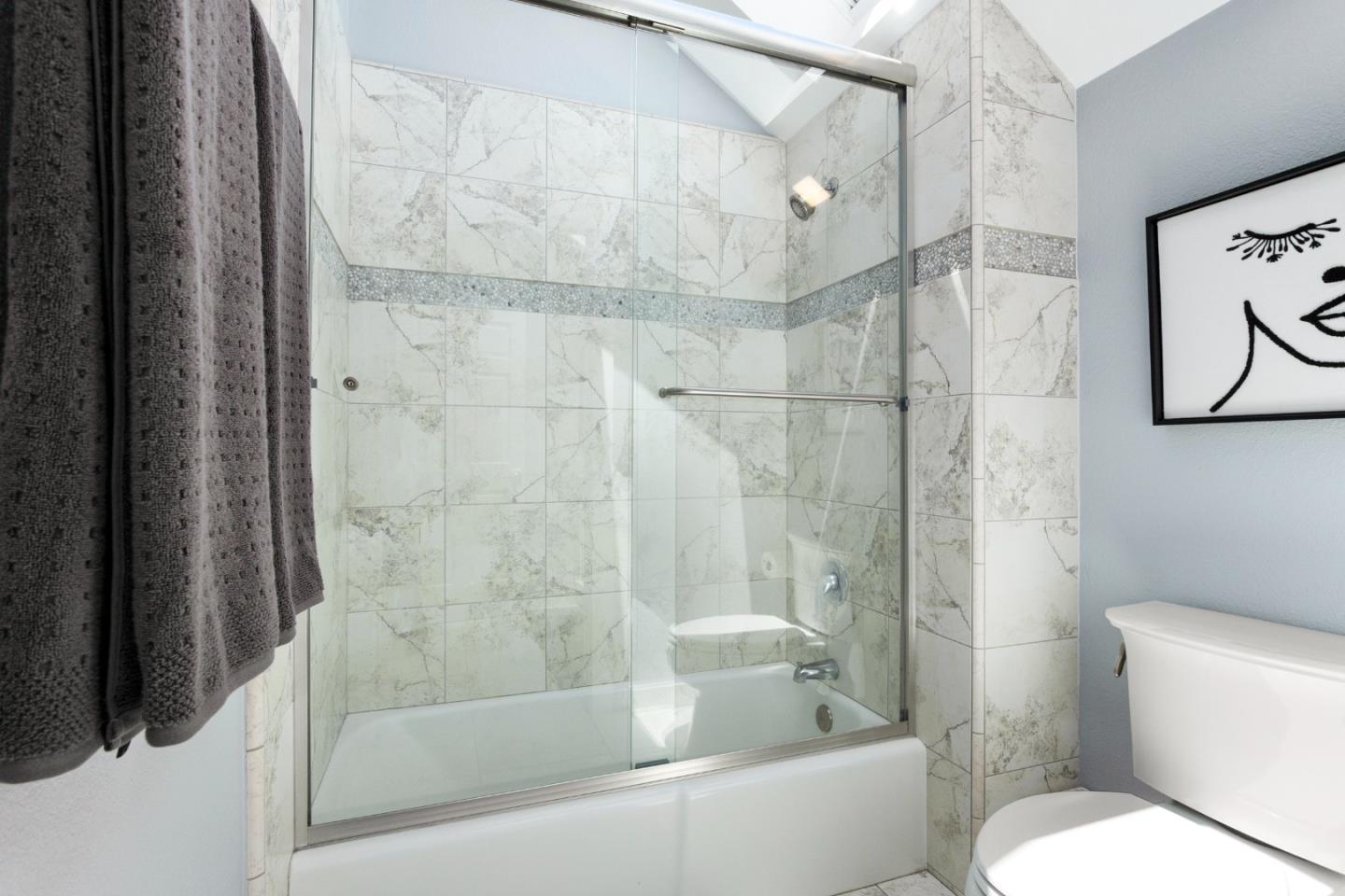 772 Aptos Ridge Circle Watsonville, CA 95076 - Photo 53 of 62 a bathroom with a bathtub and a toilet