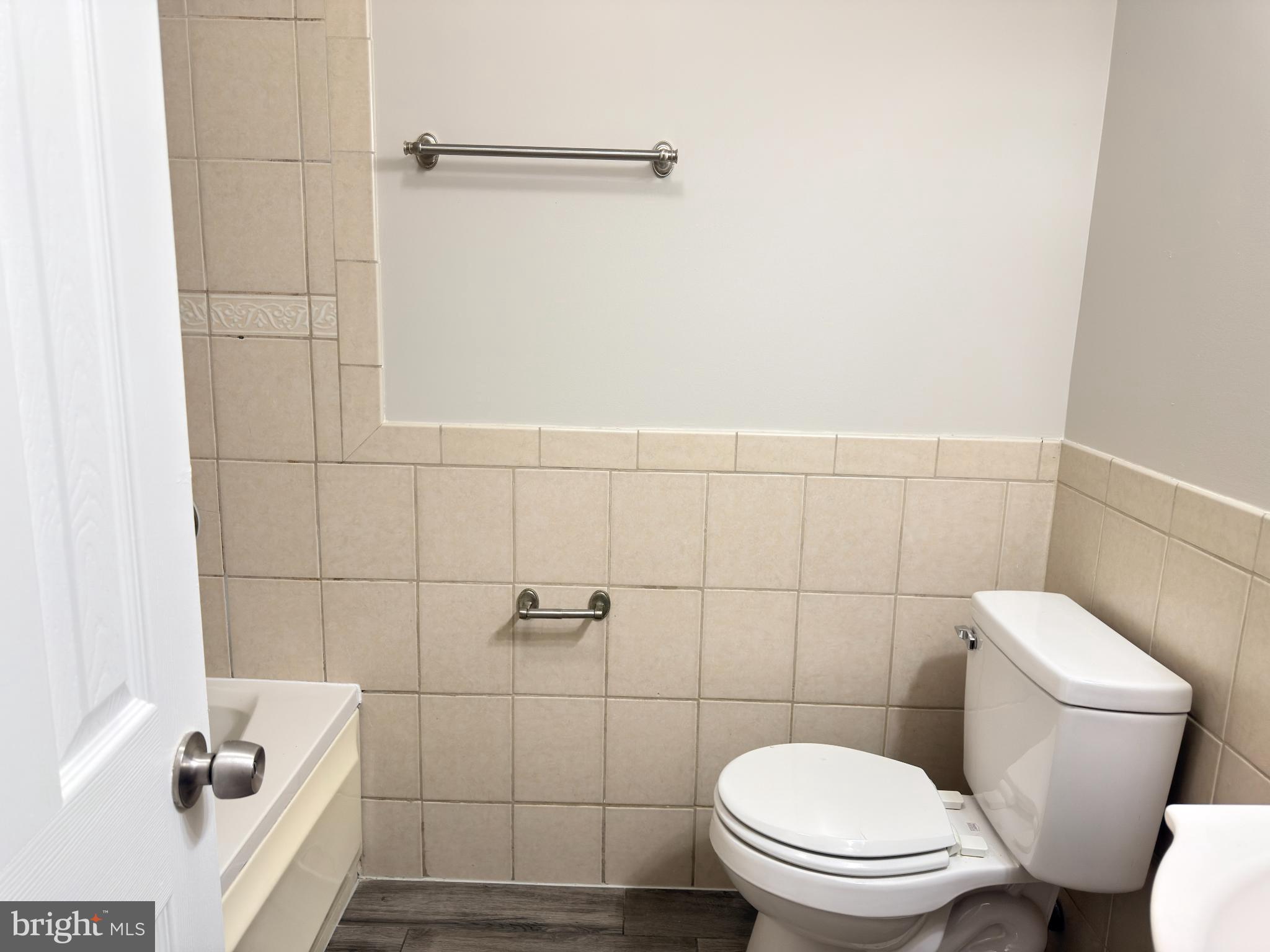 1246 Queen Street Northeast, Unit 2 Washington, DC 20002 - Photo 12 of 23 Modern bathroom with sleek tile design.