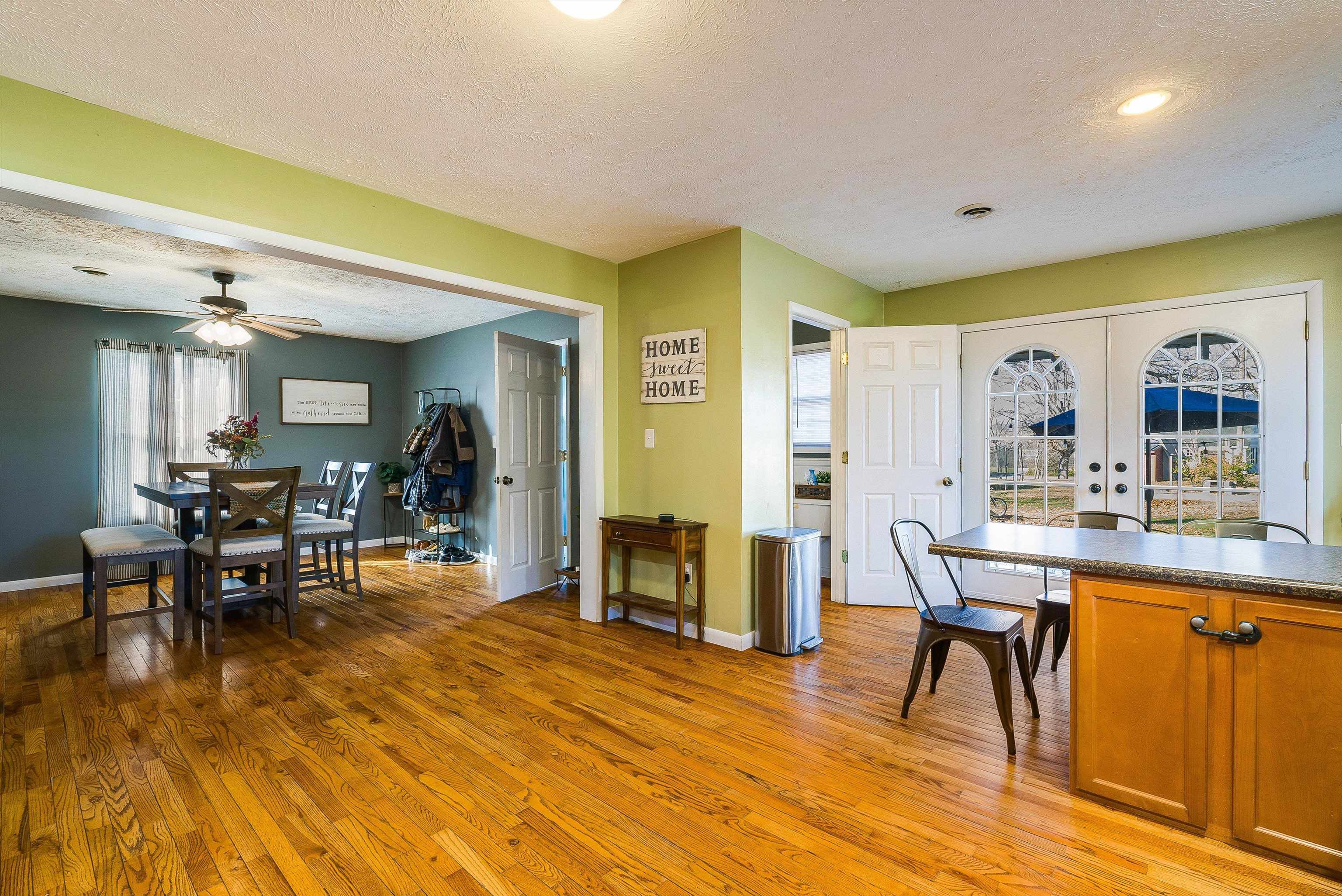 7110 Rocky Bar Road Elkton, VA 22827 - Photo 16 of 52 a view of a dining room with furniture and a table