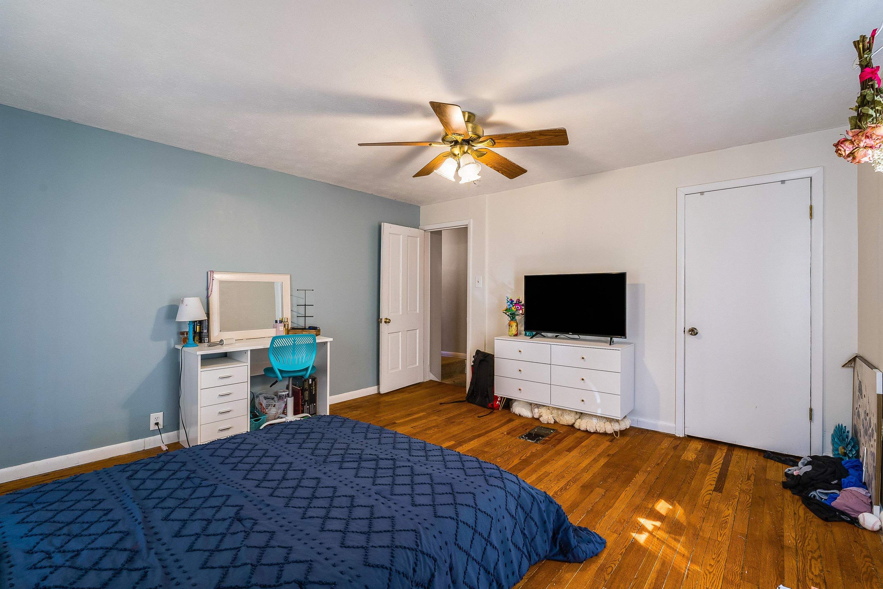 7110 Rocky Bar Road Elkton, VA 22827 - Photo 25 of 52 a bedroom with a bed and a flat screen tv