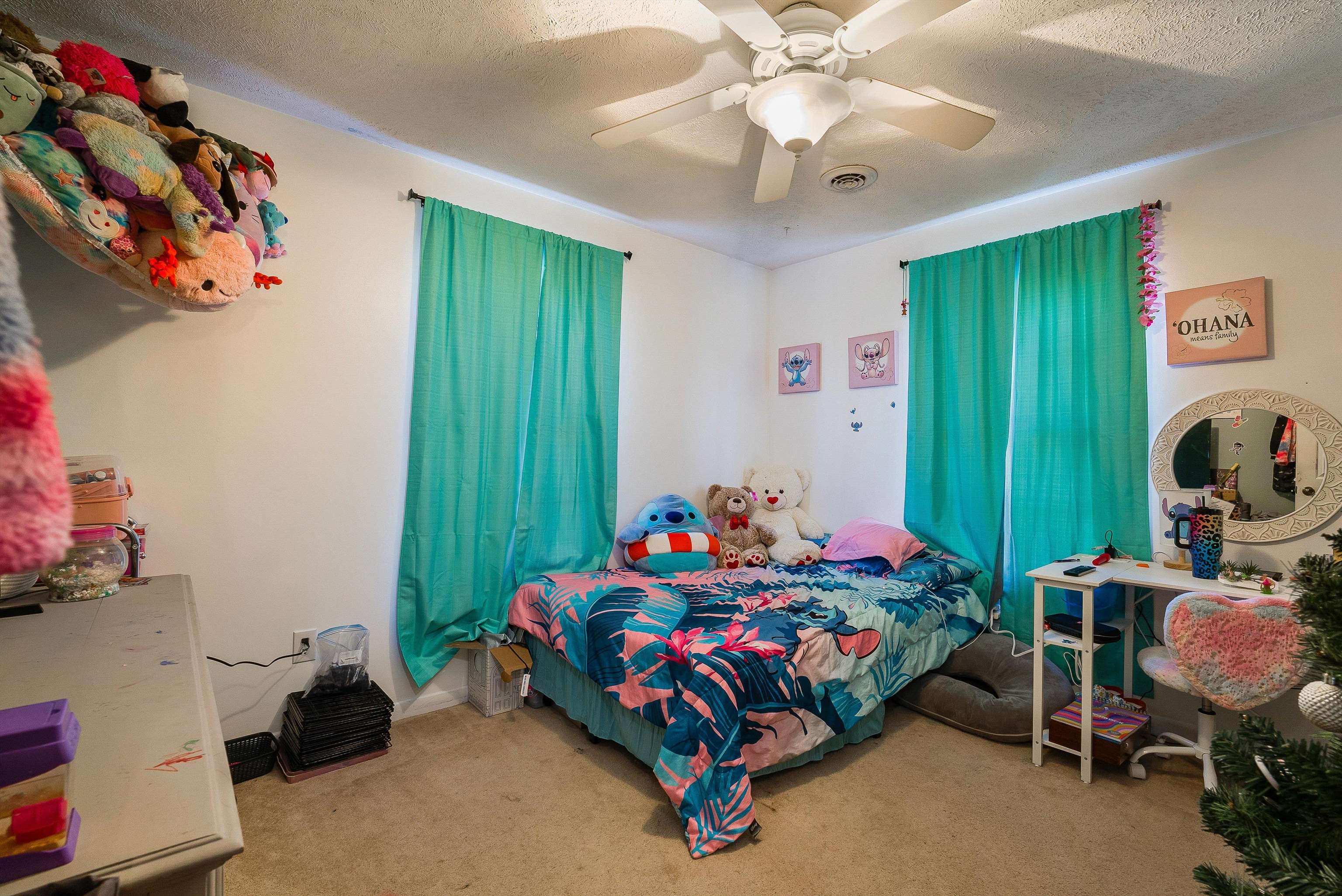 7110 Rocky Bar Road Elkton, VA 22827 - Photo 31 of 52 a bedroom with a bed and a chandelier