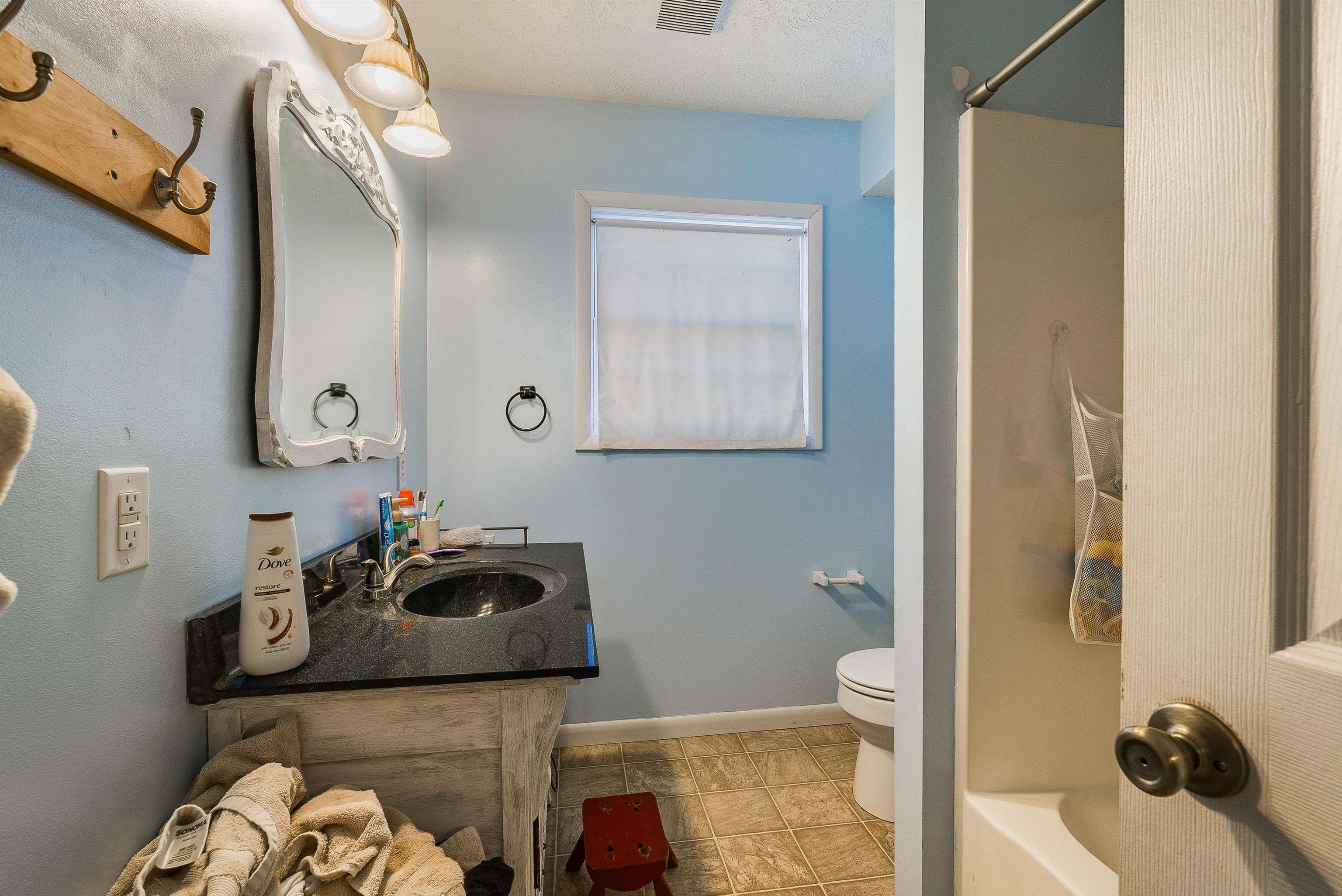 7110 Rocky Bar Road Elkton, VA 22827 - Photo 33 of 52 a bathroom with a sink and a mirror