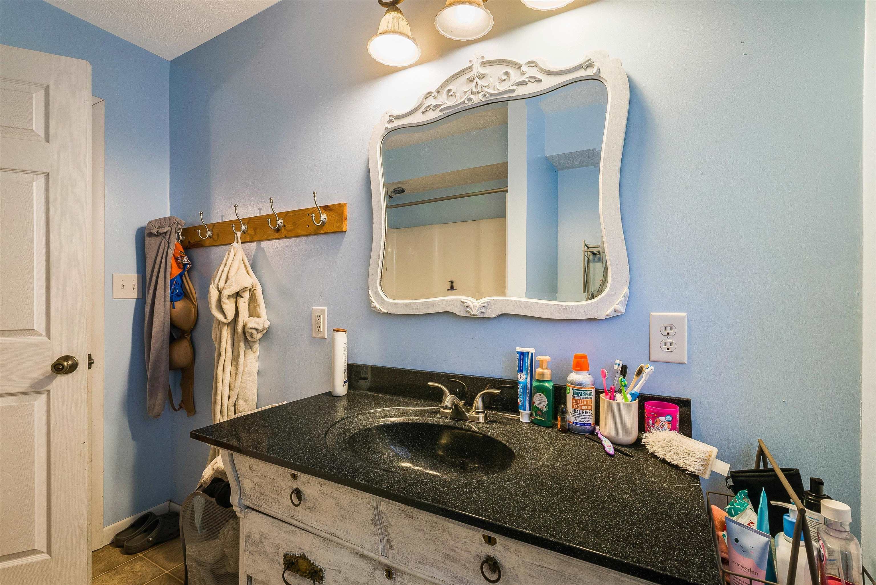 7110 Rocky Bar Road Elkton, VA 22827 - Photo 34 of 52 a bathroom with a sink and a mirror