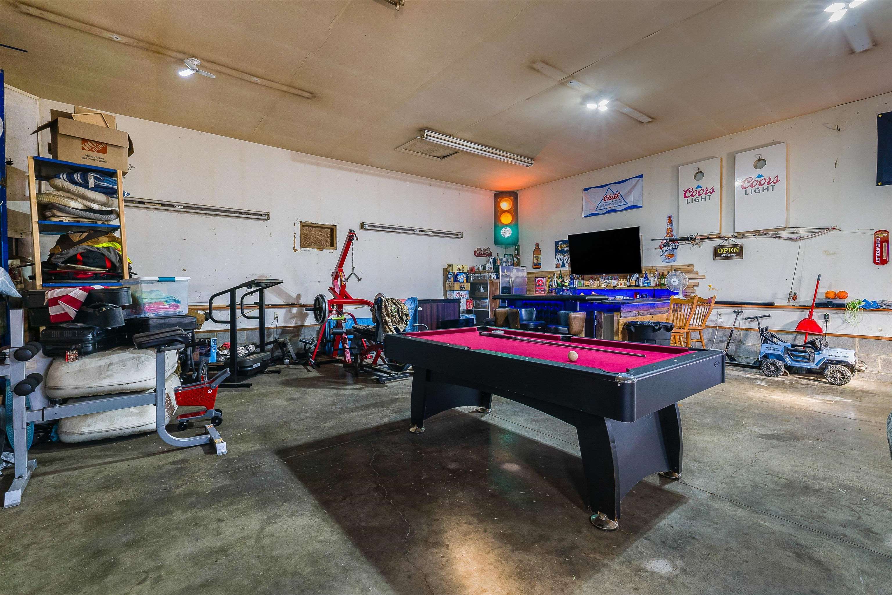 7110 Rocky Bar Road Elkton, VA 22827 - Photo 42 of 52 a room with furniture and a flat screen tv