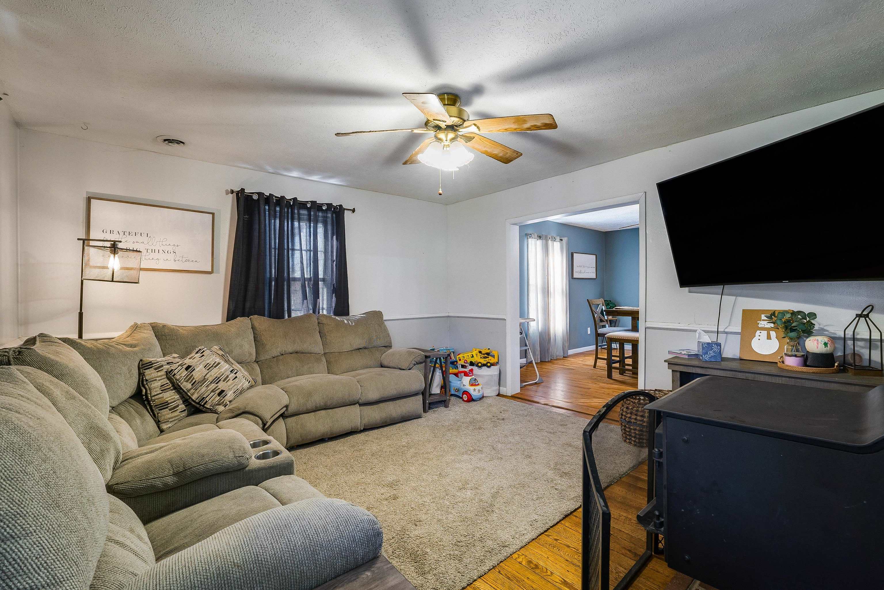 7110 Rocky Bar Road Elkton, VA 22827 - Photo 6 of 52 a living room with furniture and a flat screen tv