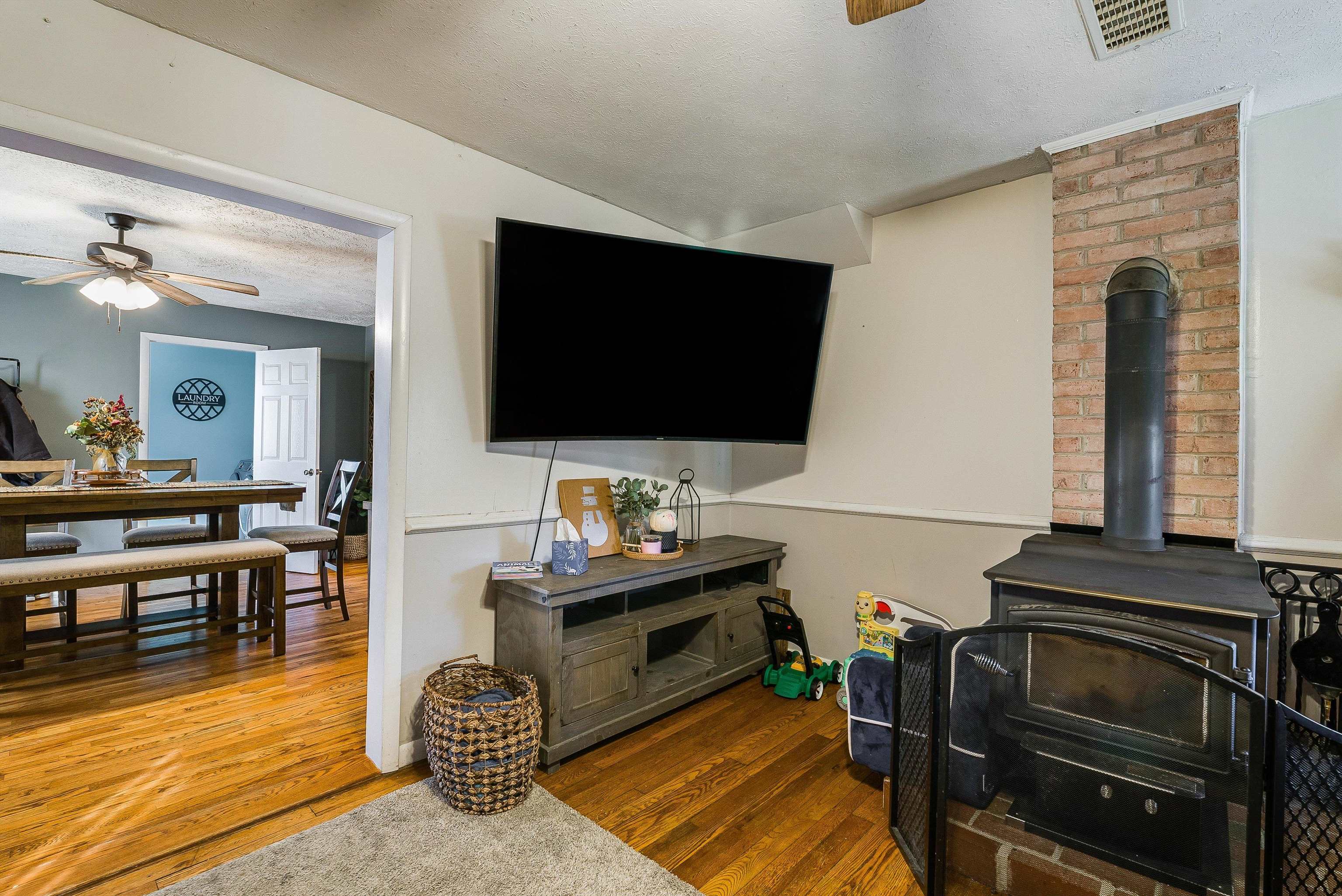 7110 Rocky Bar Road Elkton, VA 22827 - Photo 8 of 52 a living room with furniture and a flat screen tv