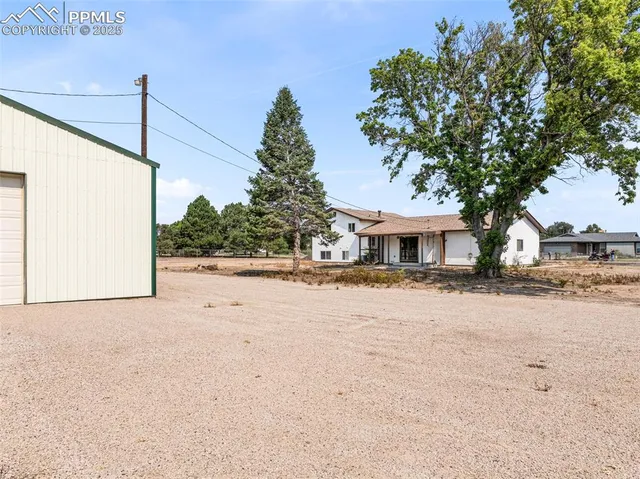 a view of a house with a garage