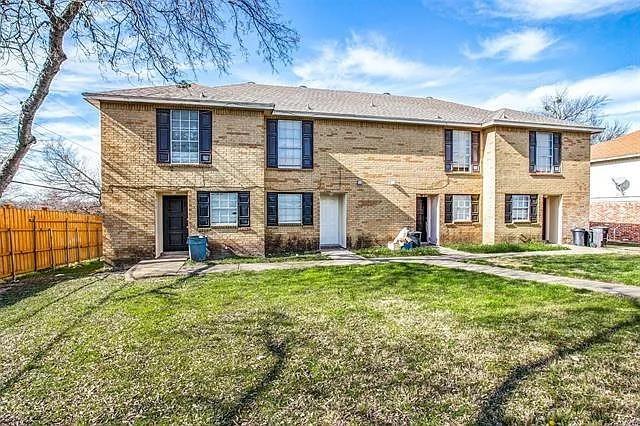 3832 Coates Circle, Unit 3838 Benbrook, TX 76116 - Photo 1 of 1 a front view of a house with a yard