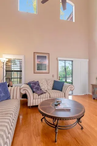a bathroom with a double vanity sink a mirror and shower