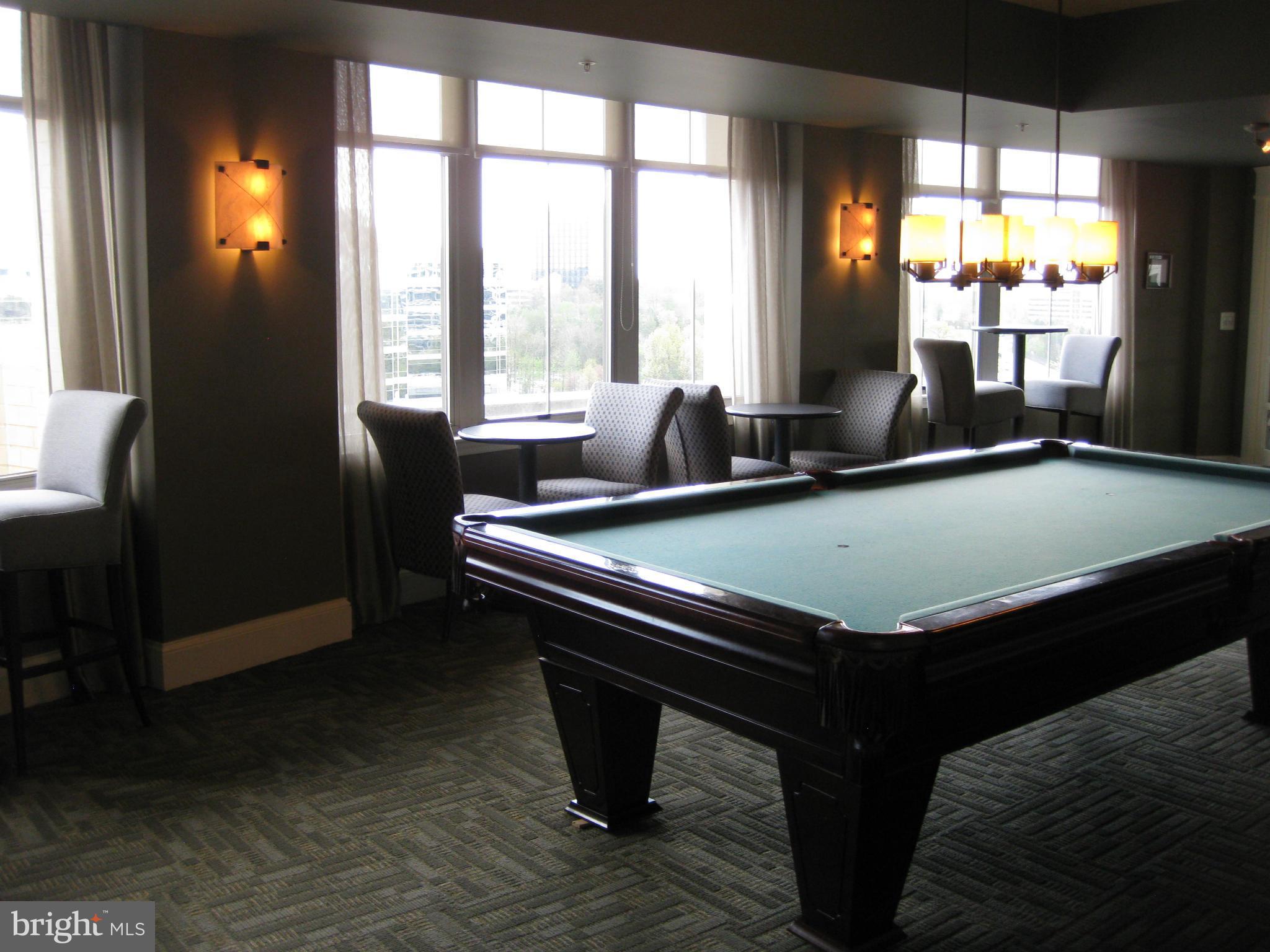 11800 Sunset Hills Road, Unit 925 Reston, VA 20190 - Photo 22 of 29 a room with pool table and windows