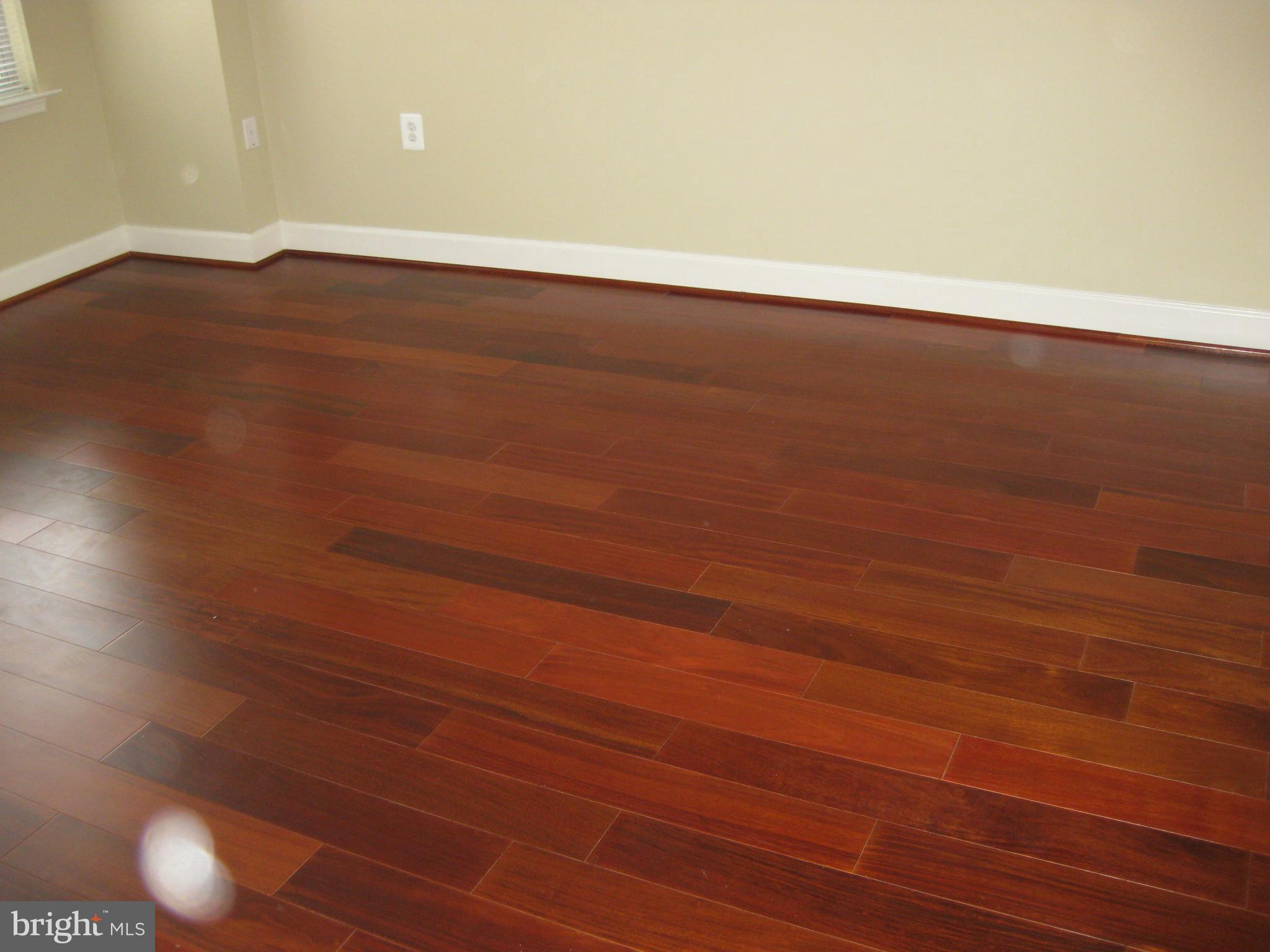 11800 Sunset Hills Road, Unit 925 Reston, VA 20190 - Photo 5 of 29 a view of an empty room with wooden floor