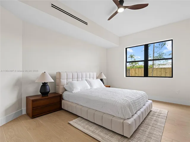 a view of a garden with an outdoor seating