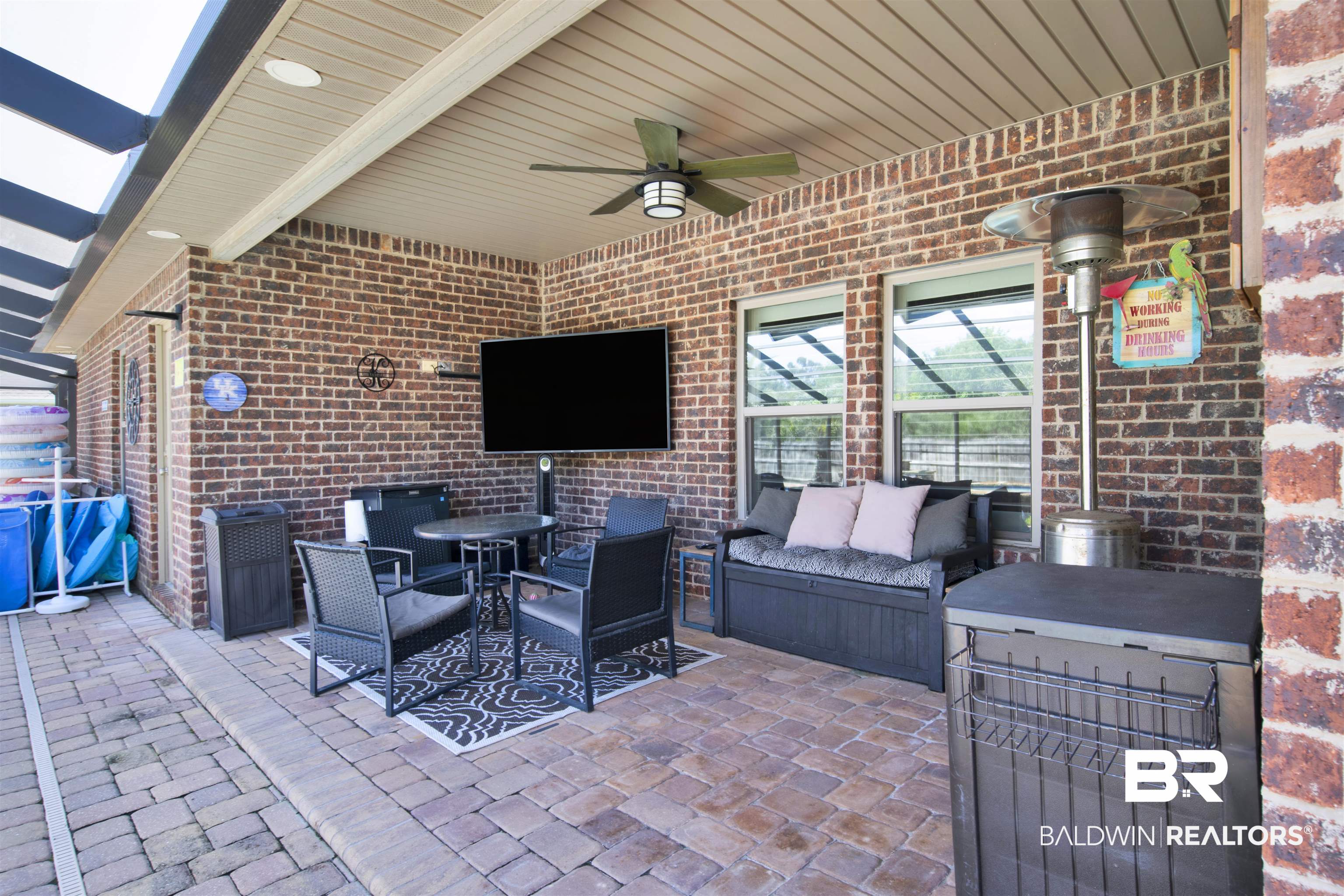 4196 Inverness Circle Gulf Shores, AL 36542 - Photo 39 of 43 View of patio with ceiling fan, an outdoor kitchen, and outdoor lounge area