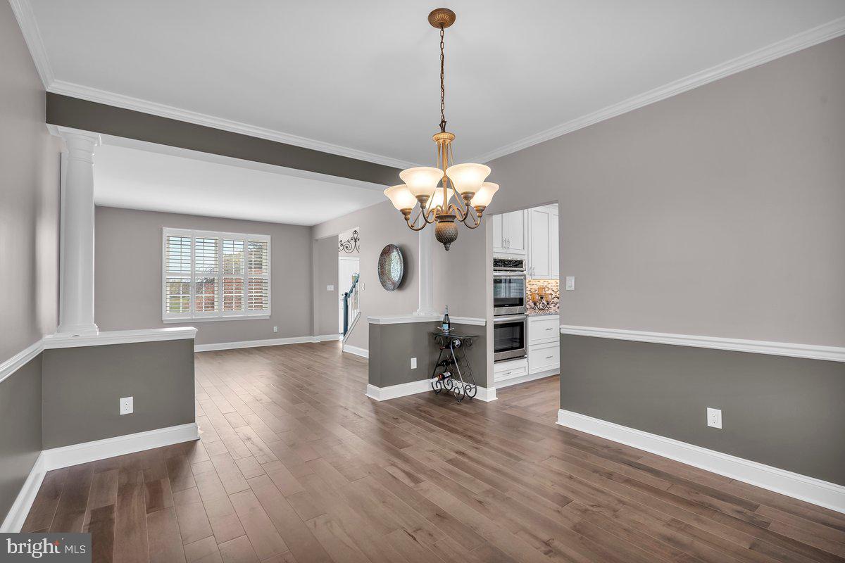 128 Willow Grove Road Shamong, NJ 08088 - Photo 11 of 84 a living room with fireplace furniture and a wooden floor