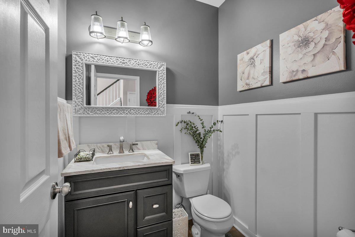 128 Willow Grove Road Shamong, NJ 08088 - Photo 12 of 84 a bathroom with a toilet sink and mirror