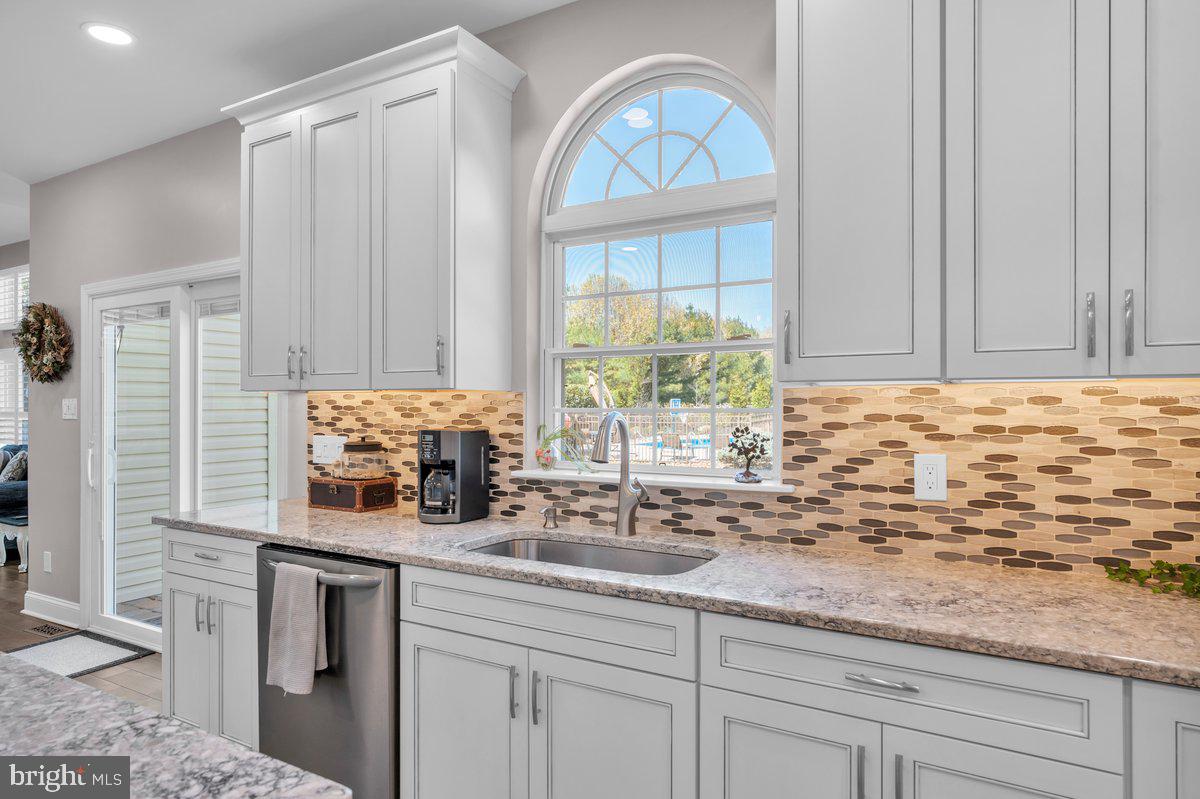 128 Willow Grove Road Shamong, NJ 08088 - Photo 19 of 84 a kitchen with granite countertop a sink stainless steel appliances and cabinets