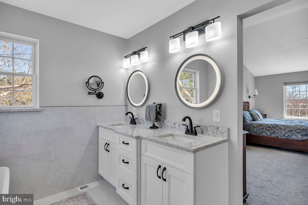 128 Willow Grove Road Shamong, NJ 08088 - Photo 35 of 84 a bathroom with a granite countertop double vanity sink and a mirror