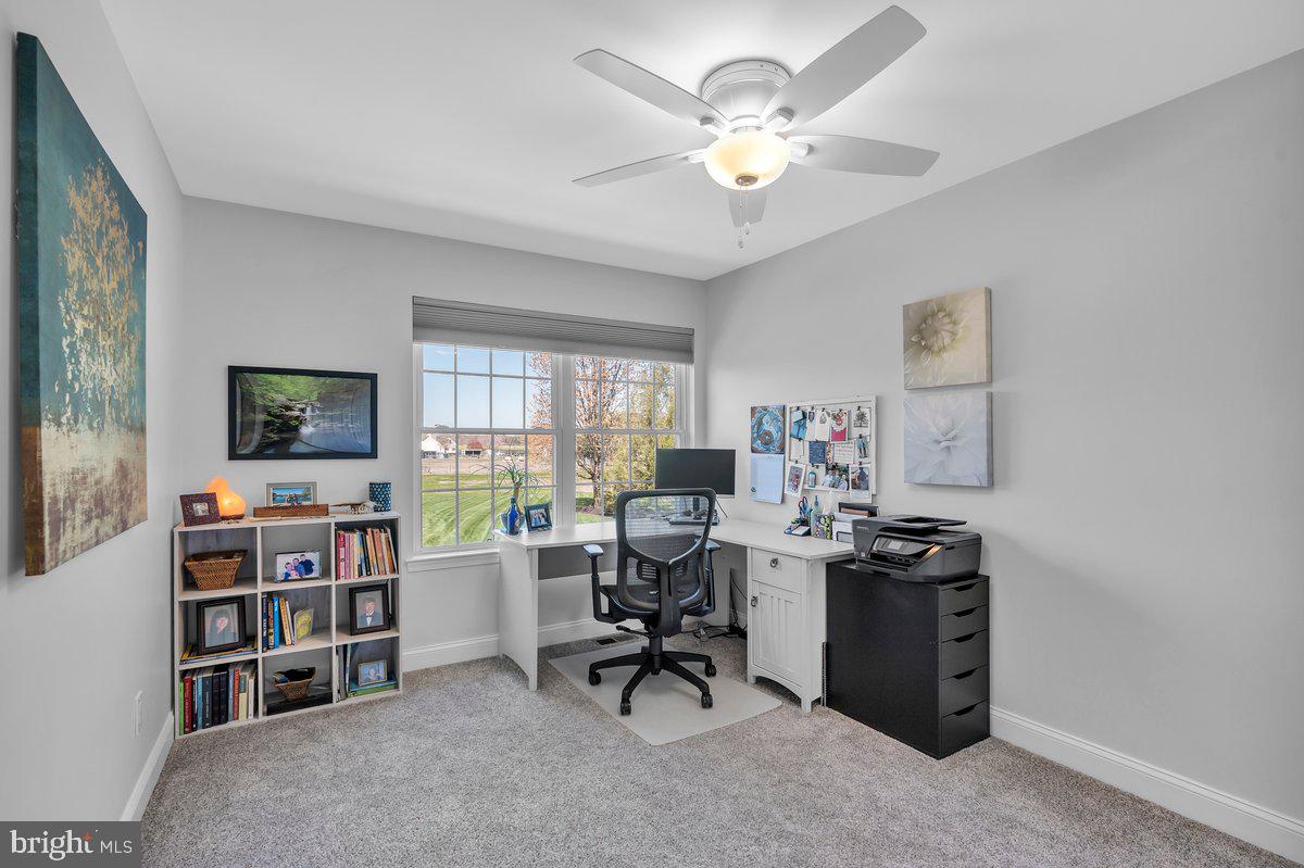 128 Willow Grove Road Shamong, NJ 08088 - Photo 41 of 84 a view of a workspace with a bookshelf