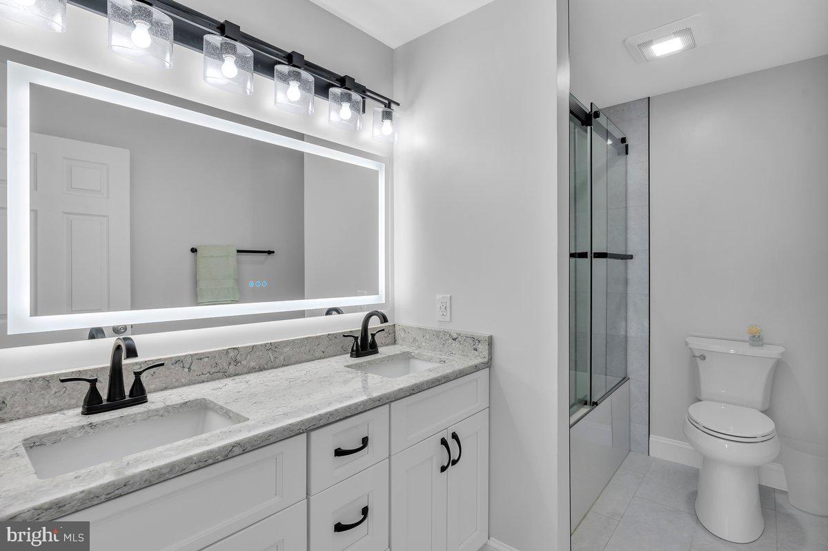 128 Willow Grove Road Shamong, NJ 08088 - Photo 43 of 84 a bathroom with a granite countertop sink toilet and shower
