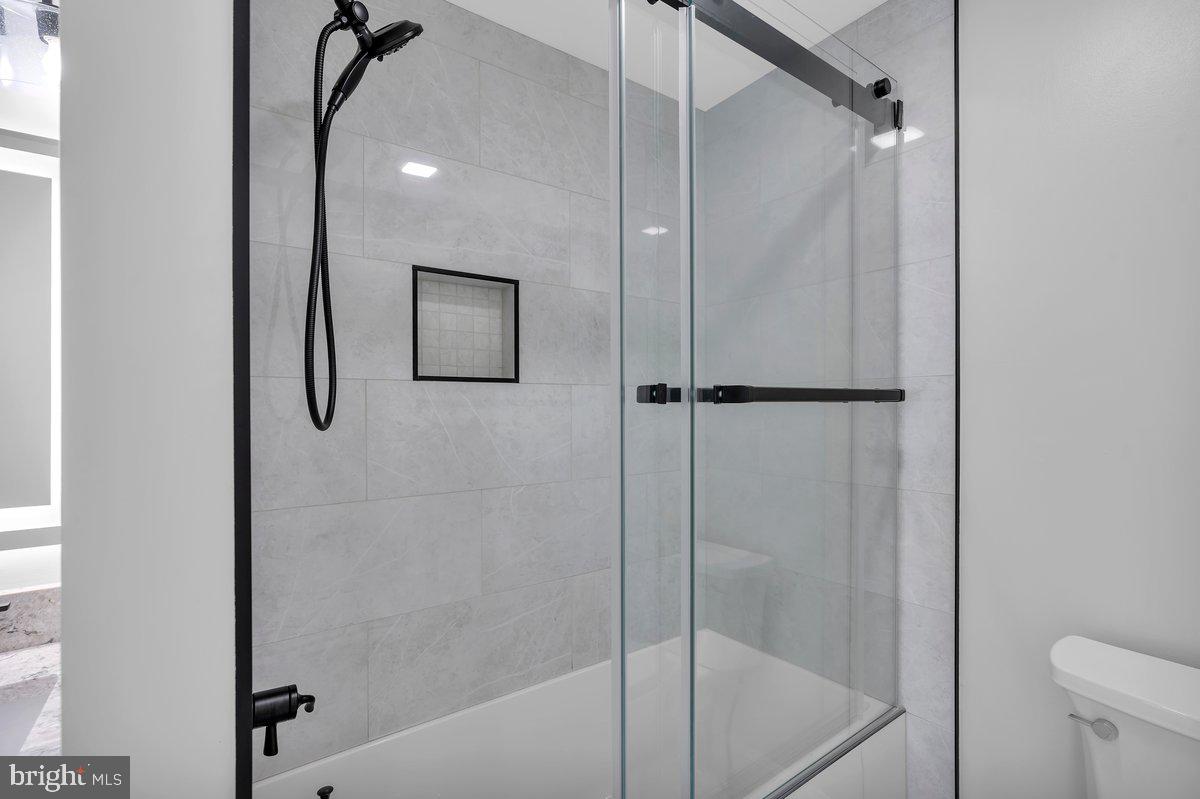 128 Willow Grove Road Shamong, NJ 08088 - Photo 44 of 84 a bathroom with a shower and a bath tub