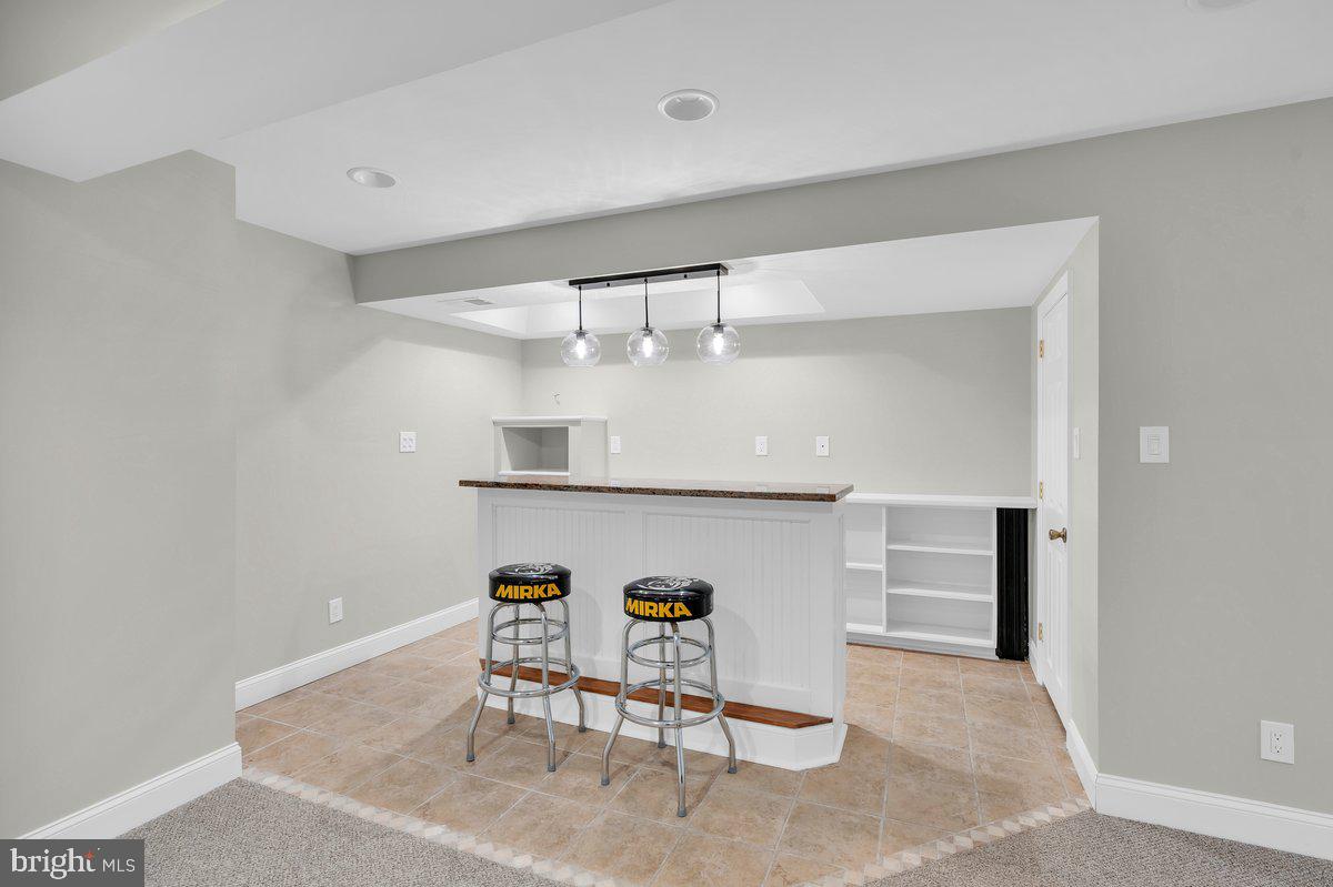 128 Willow Grove Road Shamong, NJ 08088 - Photo 48 of 84 a view of dining room and kitchen with a sink