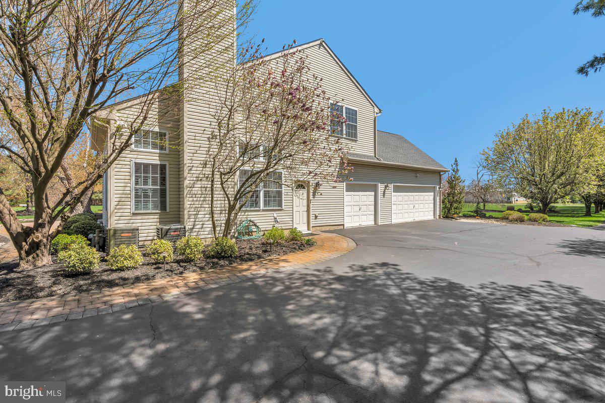 128 Willow Grove Road Shamong, NJ 08088 - Photo 54 of 84 a view of a house with a yard and garage