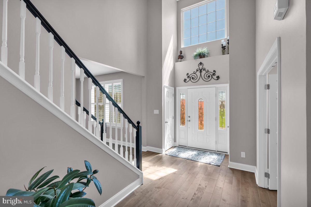 128 Willow Grove Road Shamong, NJ 08088 - Photo 6 of 84 a view of an entryway with wooden floor