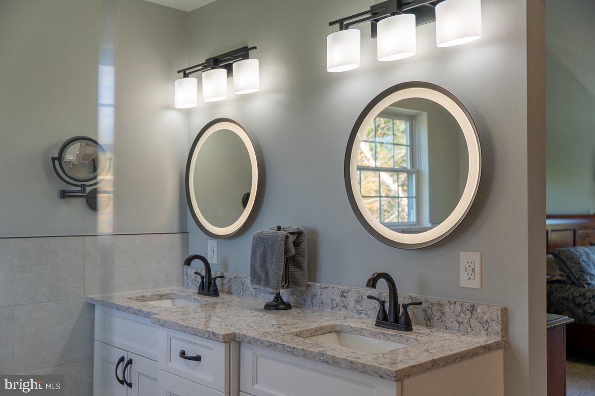 128 Willow Grove Road Shamong, NJ 08088 - Photo 68 of 84 a bathroom with a granite countertop double vanity sink and a mirror