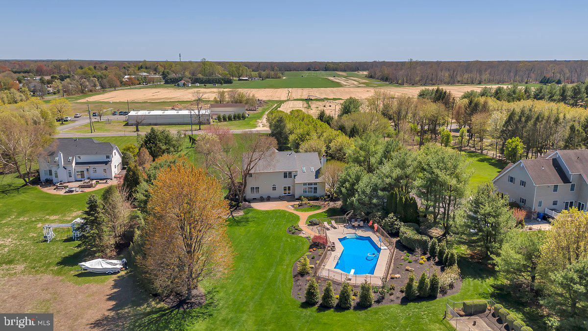 128 Willow Grove Road Shamong, NJ 08088 - Photo 74 of 84 an aerial view of a house with a swimming pool outdoor seating and yard