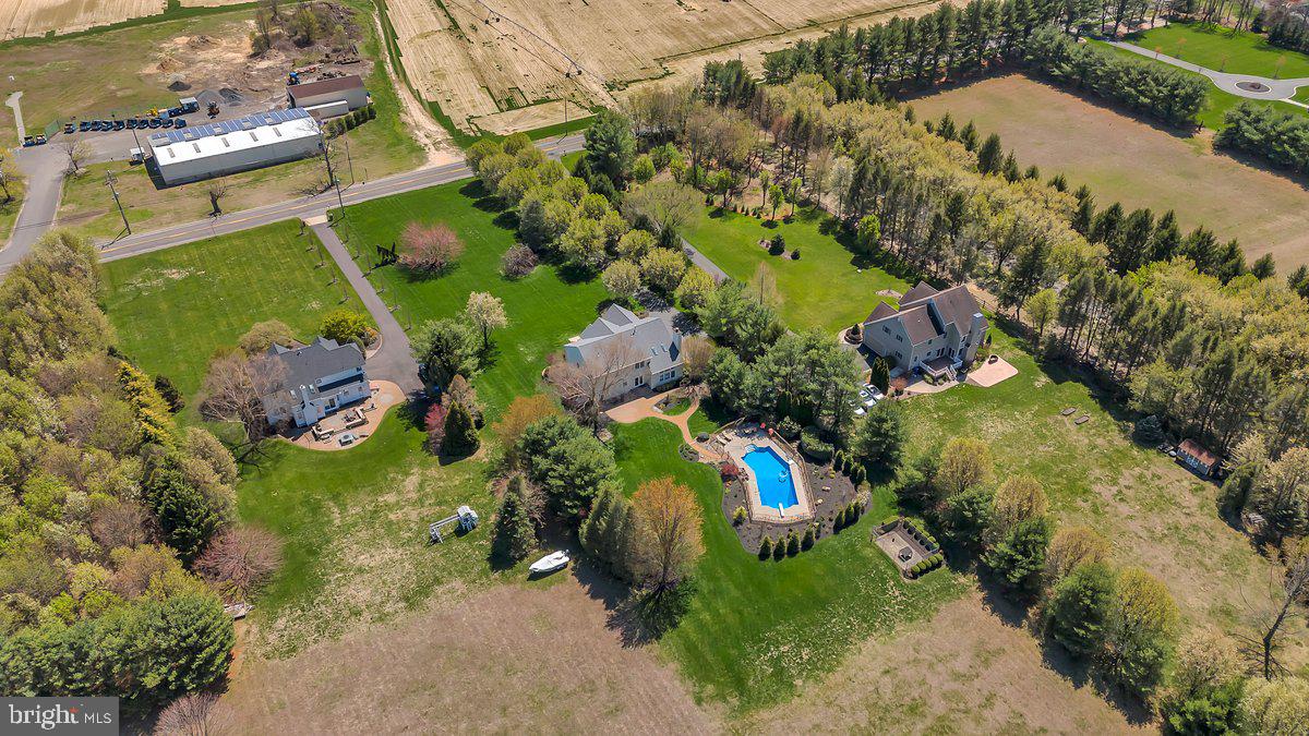 128 Willow Grove Road Shamong, NJ 08088 - Photo 75 of 84 an aerial view of a house with a yard and lake view