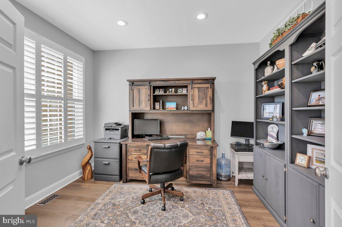 128 Willow Grove Road Shamong, NJ 08088 - Photo 8 of 84 a view of a workspace with furniture and a window