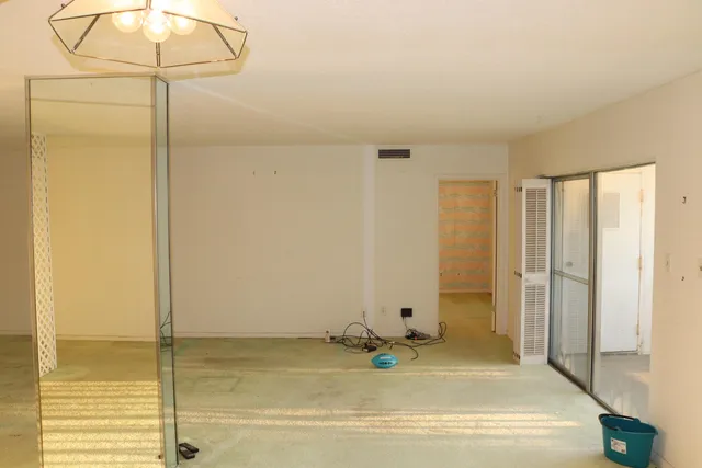 a kitchen with a refrigerator and countertop