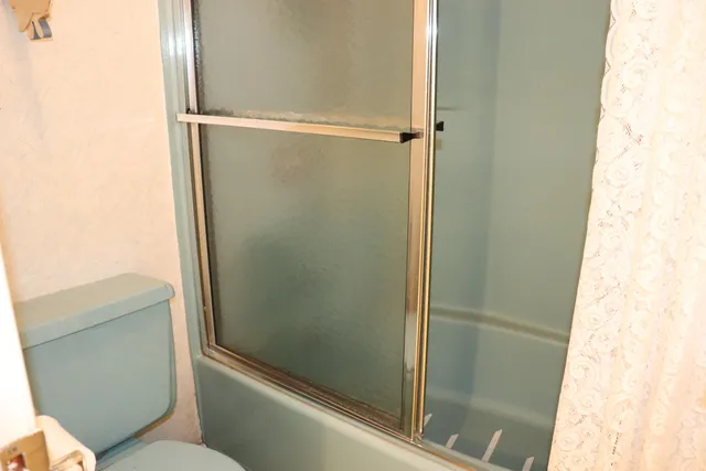 a view of a street with cars