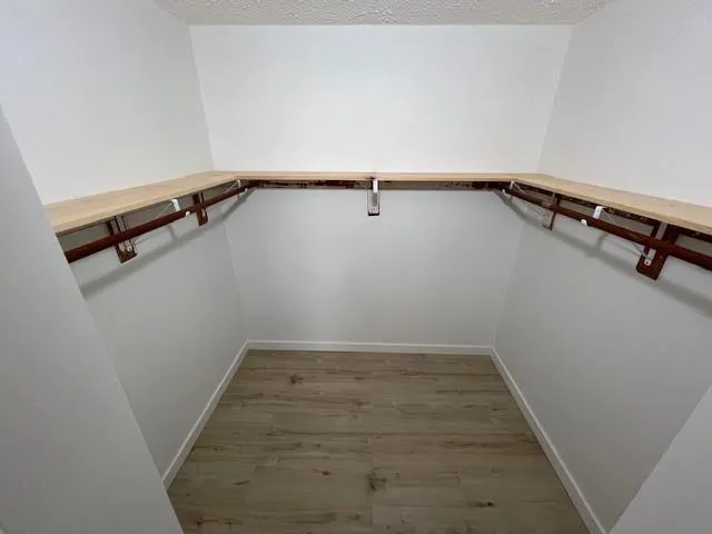 a view of a room with racks on the wall