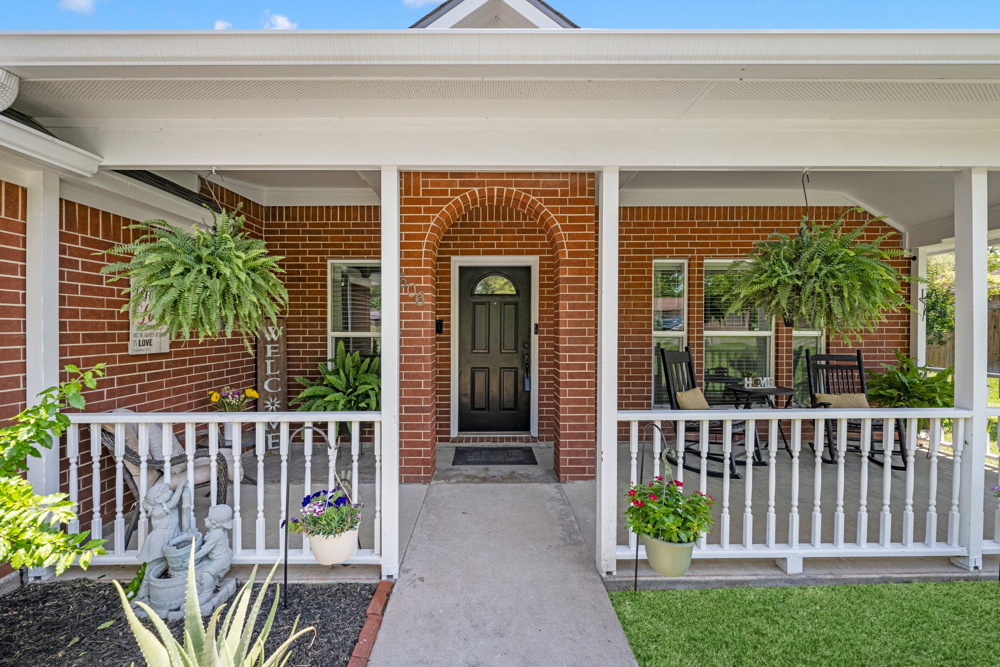 a front view of a house with a porch