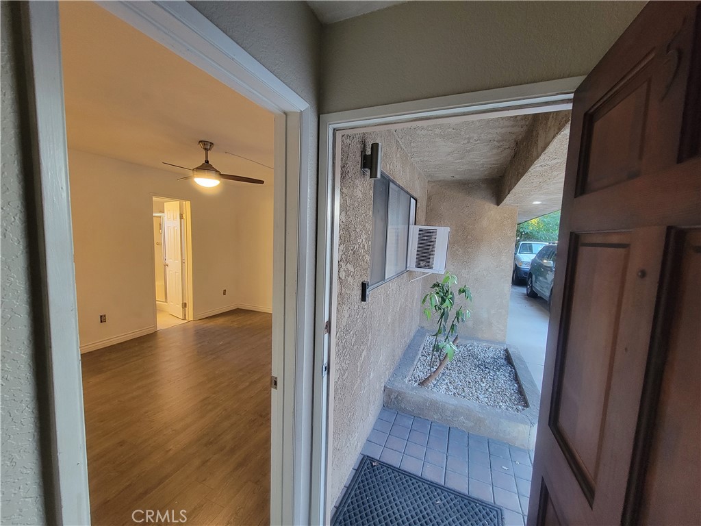 15005 Indiana Paramount, CA 90723 - Photo 2 of 7 a view of a hallway and interior of the house