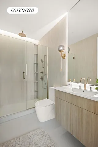 a bedroom with furniture and a large window