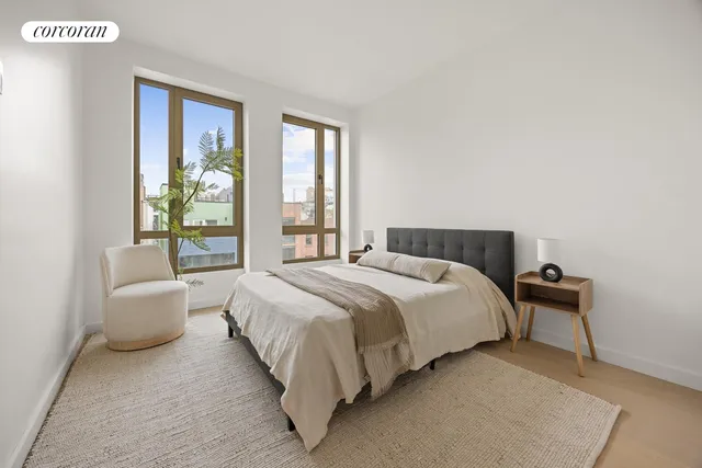 a bathroom with a double vanity sink mirror and shower