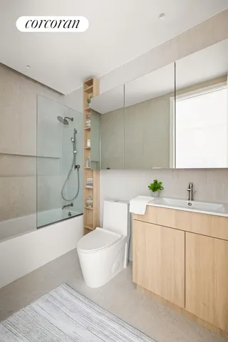 a bedroom with bed and a window