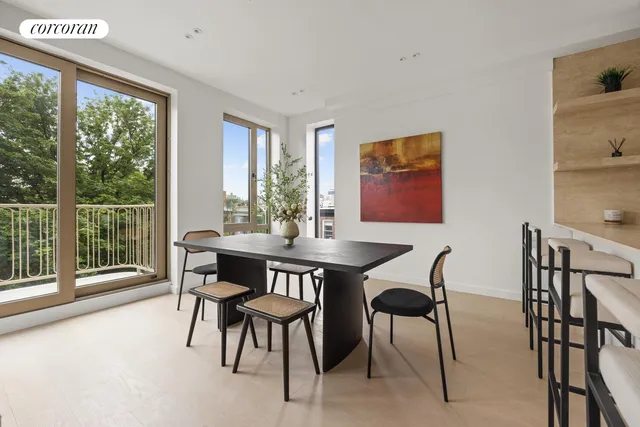 a view of a room with a large window