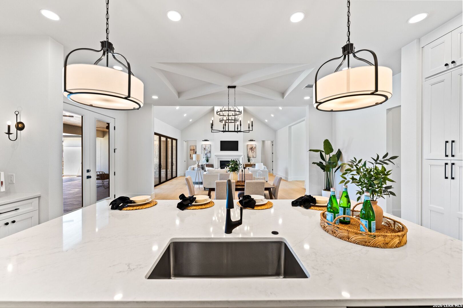 34793 High Gate Road Bulverde, TX 78163 - Photo 15 of 50 a kitchen with a sink a counter and cabinets