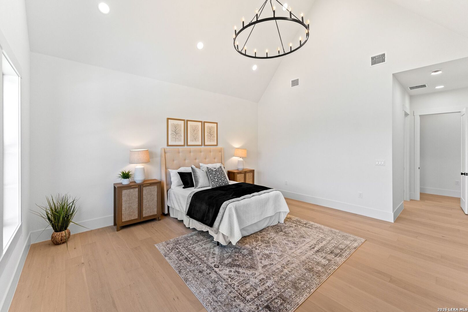 34793 High Gate Road Bulverde, TX 78163 - Photo 27 of 50 a bedroom with a bed and a table