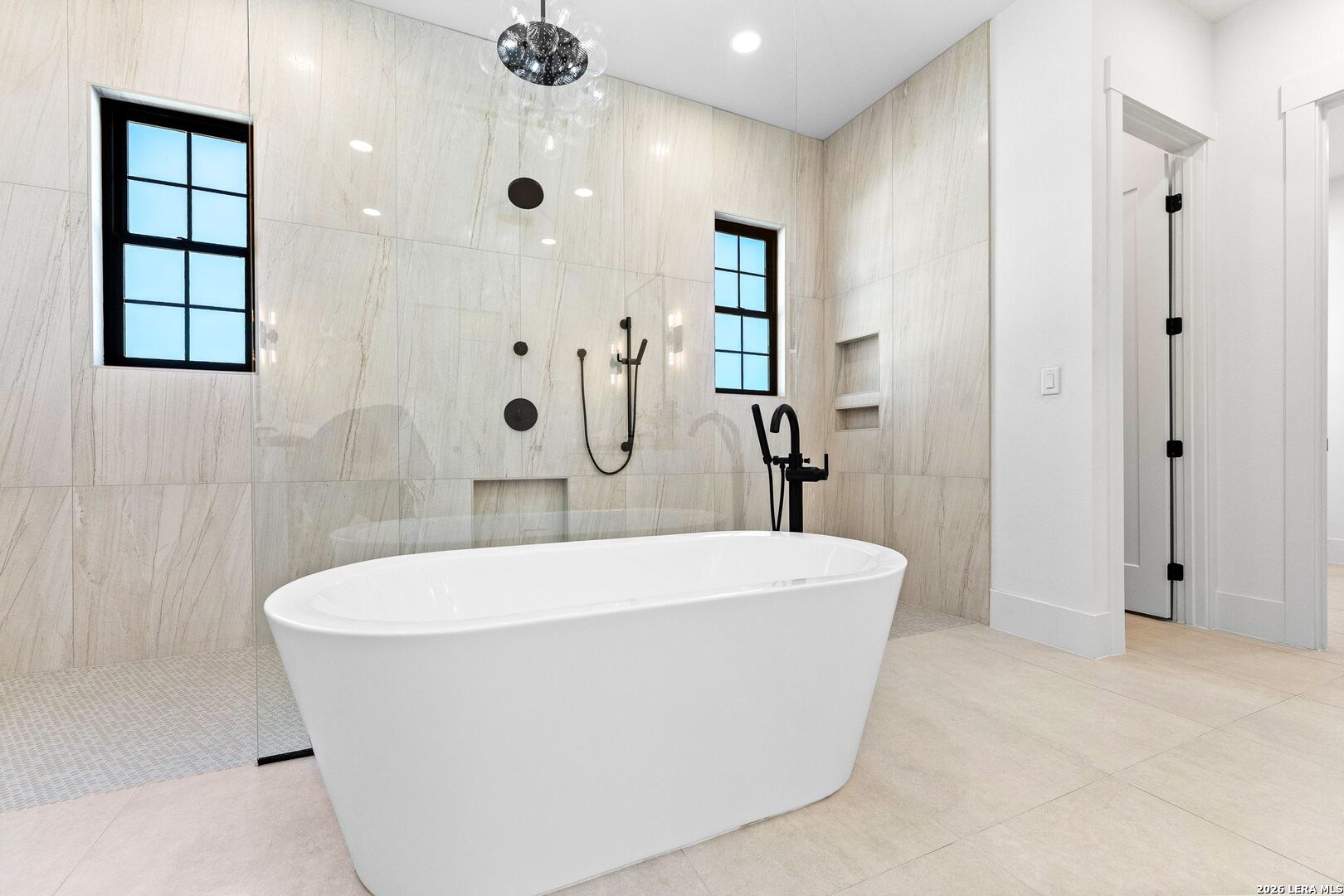 34793 High Gate Road Bulverde, TX 78163 - Photo 29 of 50 a white bath tub sitting in a bathroom