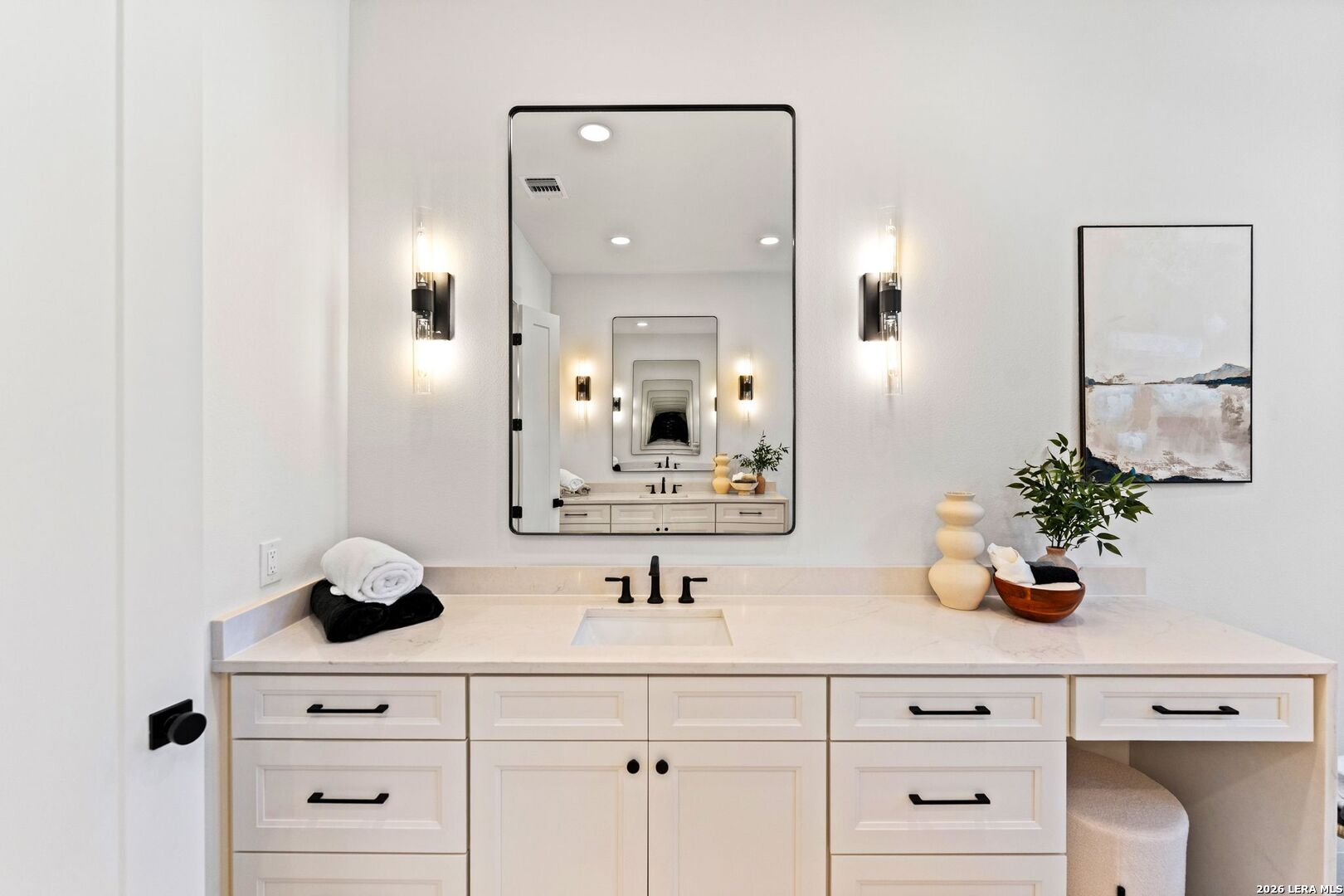 34793 High Gate Road Bulverde, TX 78163 - Photo 30 of 50 a bathroom with sink and mirror