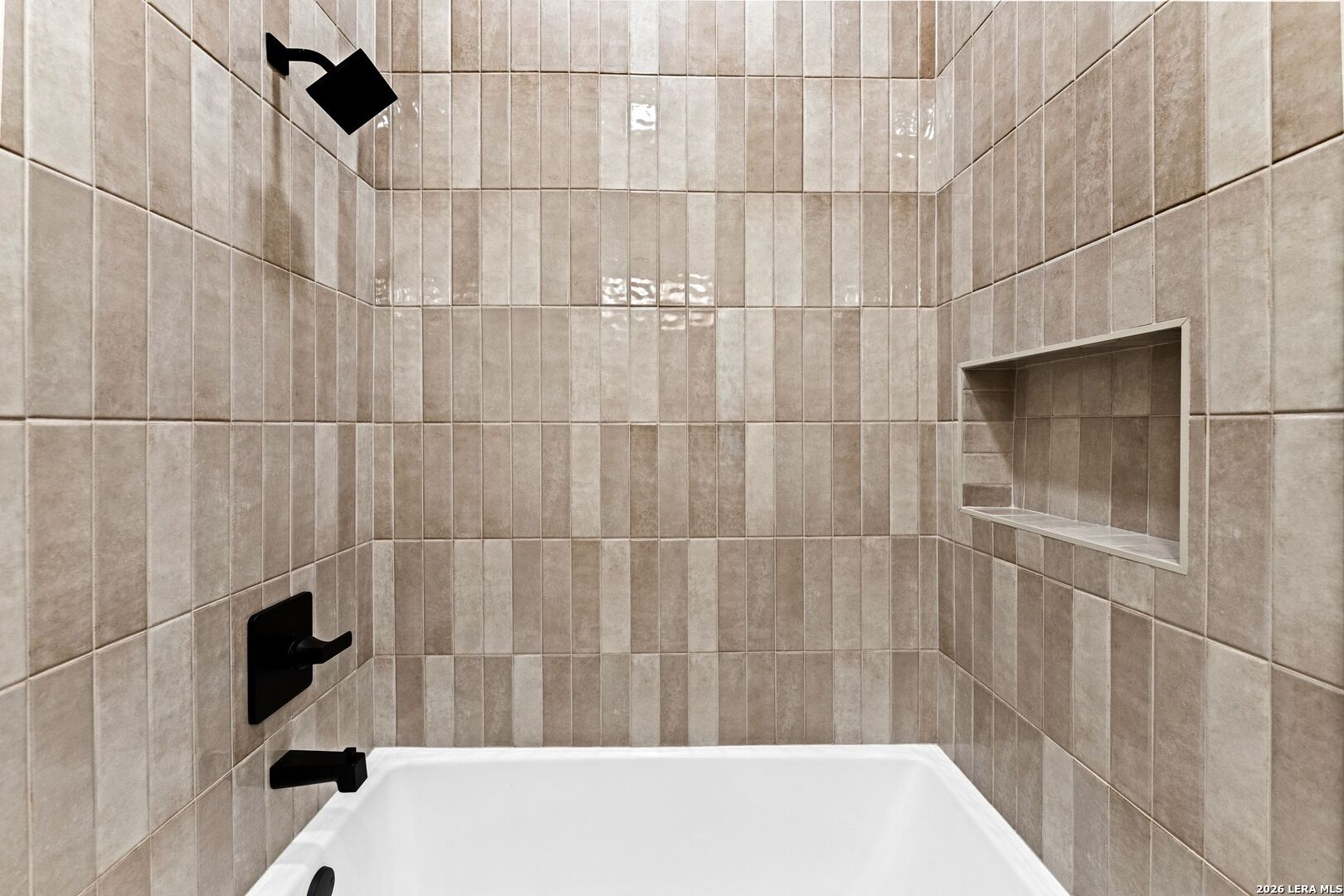 34793 High Gate Road Bulverde, TX 78163 - Photo 38 of 50 a bathroom with a bathtub and shower