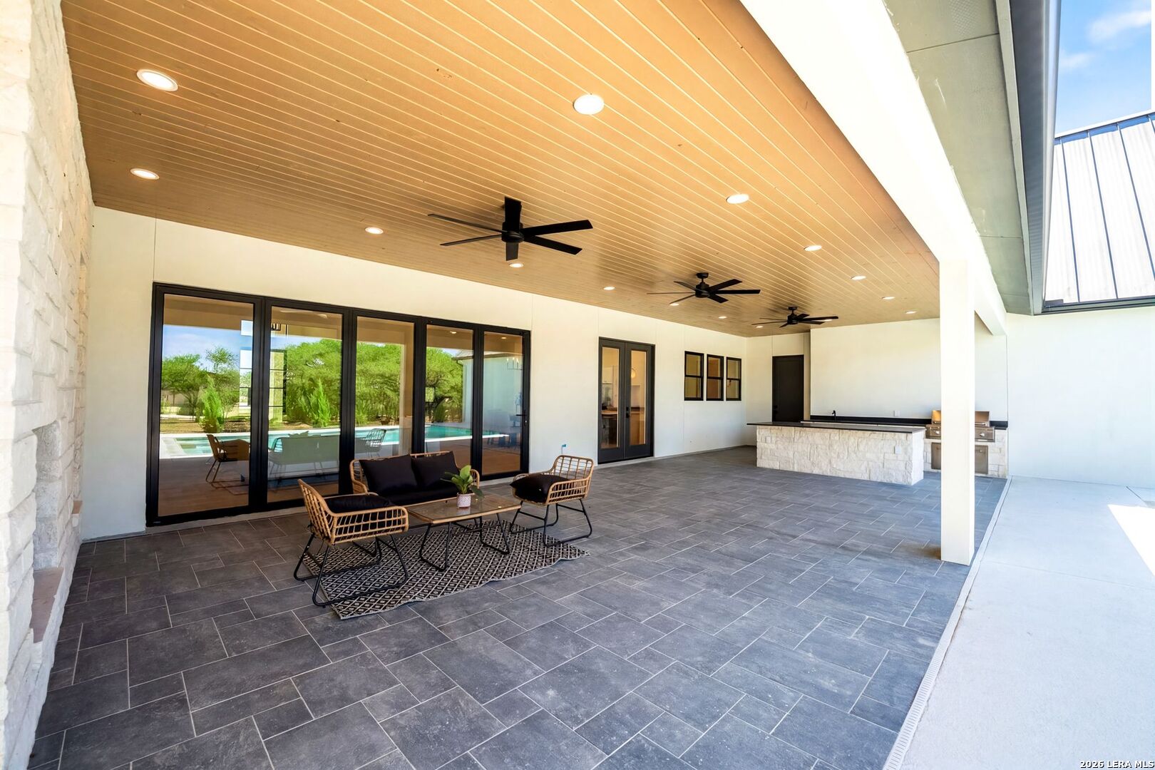 34793 High Gate Road Bulverde, TX 78163 - Photo 39 of 50 a living room with furniture and a large window