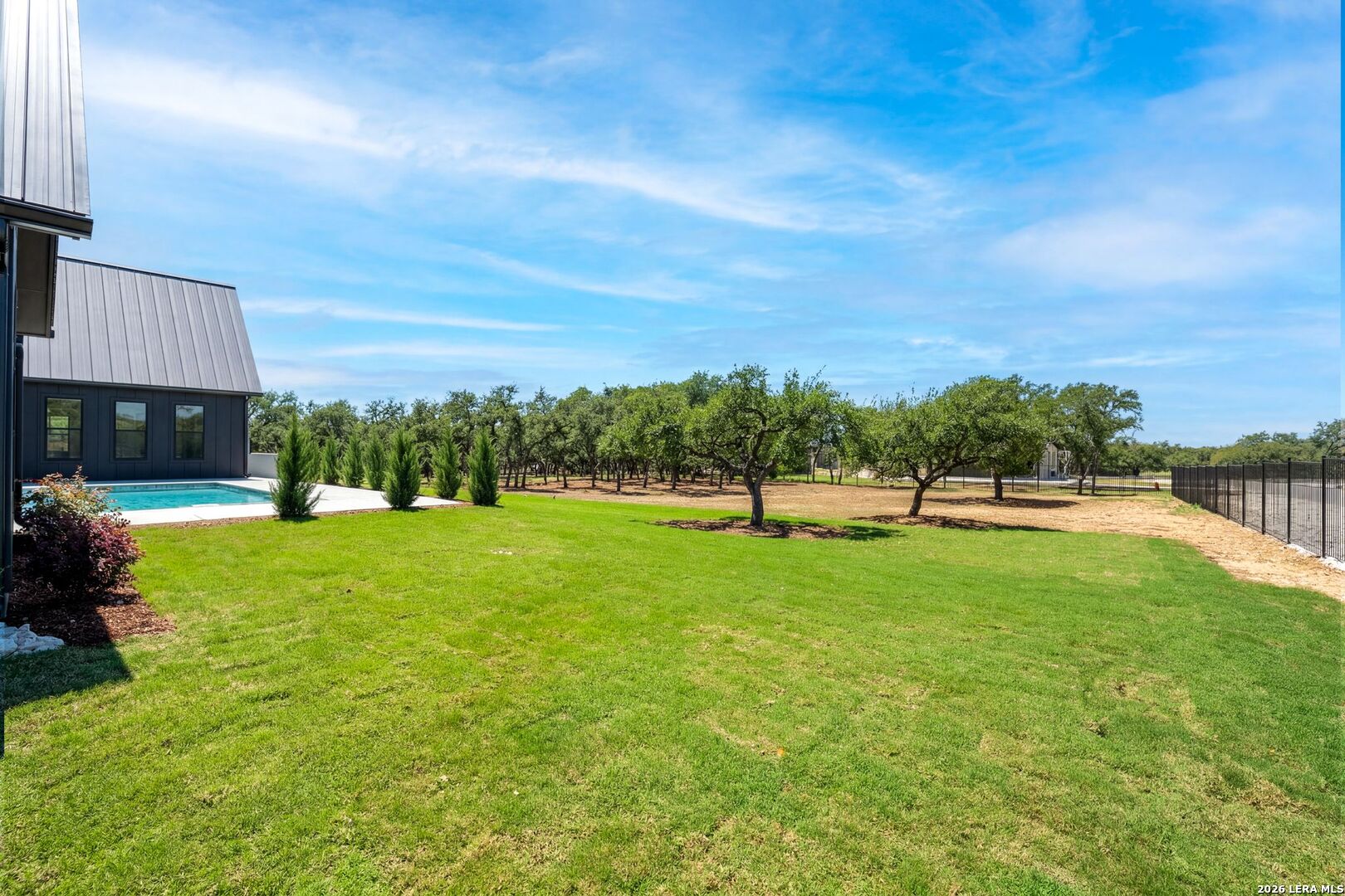 34793 High Gate Road Bulverde, TX 78163 - Photo 49 of 50 a view of a big yard with a house