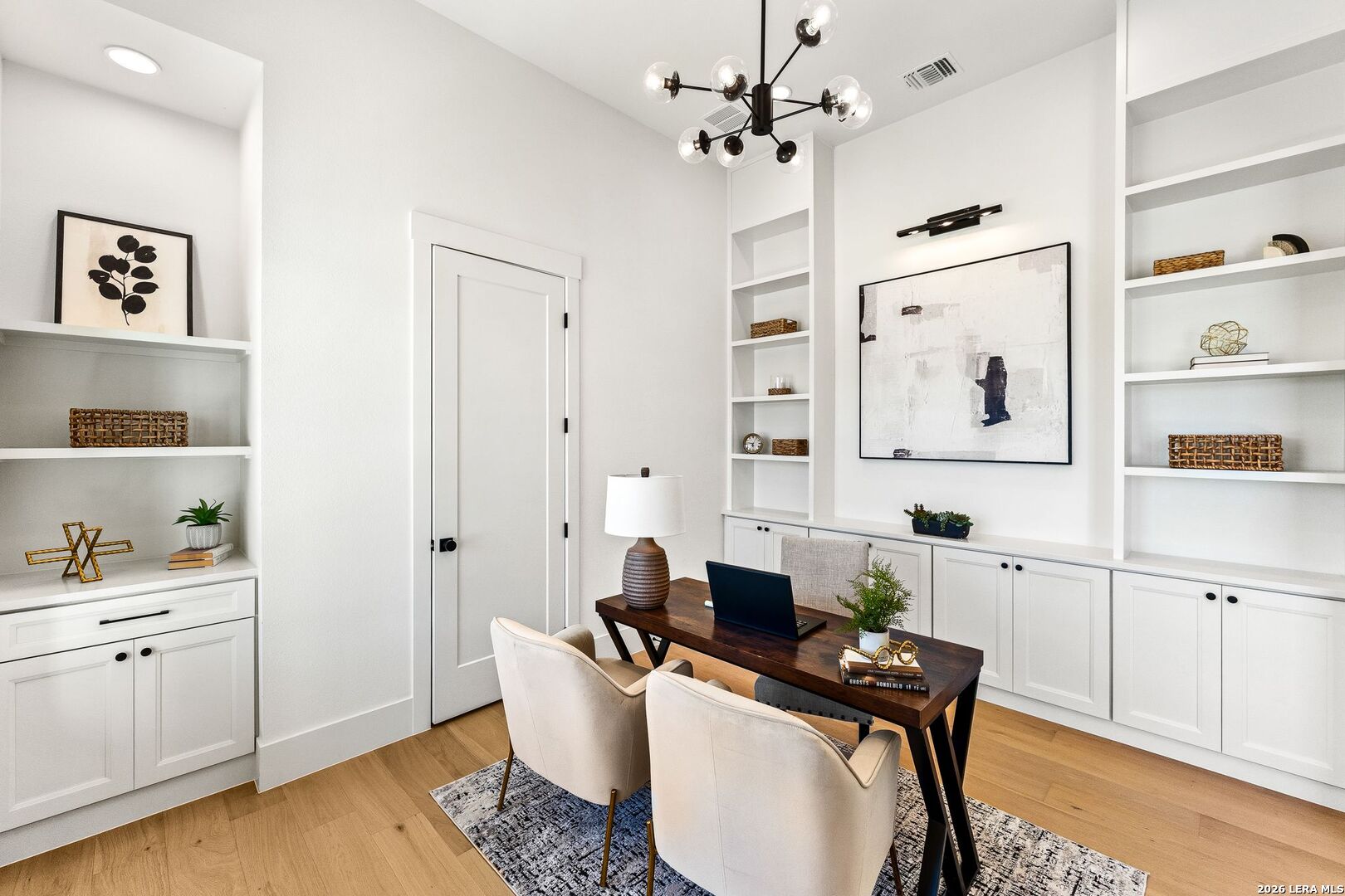 34793 High Gate Road Bulverde, TX 78163 - Photo 6 of 50 a view of a dining room with furniture and wooden floor
